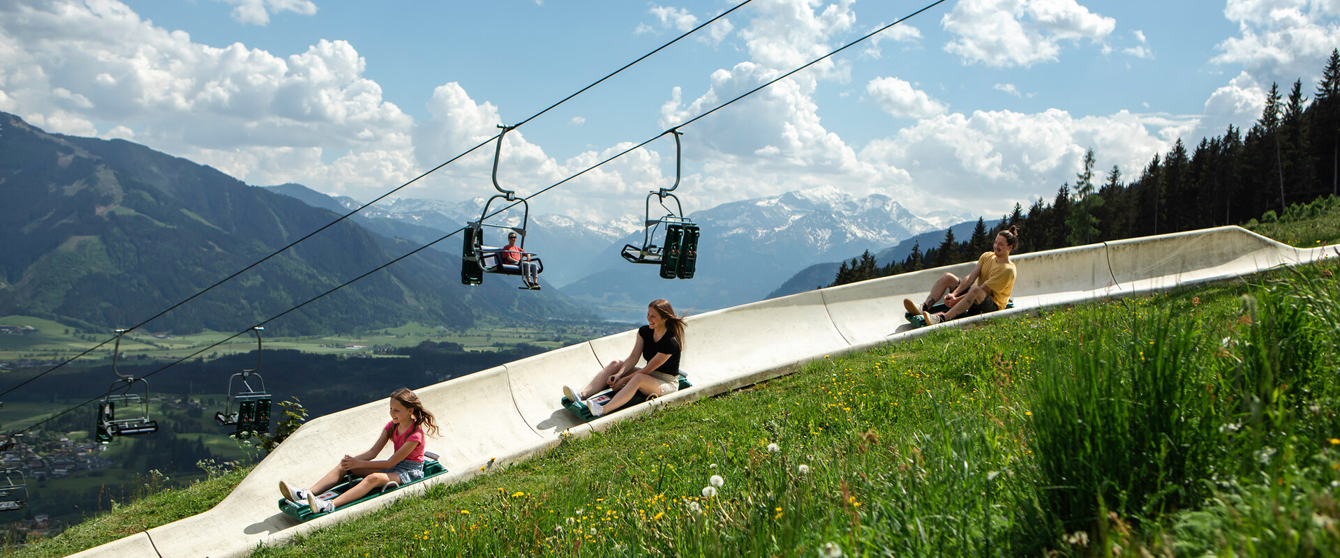 Family on the summer toboggan run in Saalfelden-Leogang | © Roland Haschka