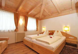 Schlafzimmer im Luxus-Appartement Steiner Leogang