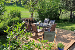 garden with wooden terrasse and furniture garden with wooden terrasse and furniture