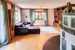 Living room, tiled stove, sleeping couch, EschenWald Living room, tiled stove, sleeping couch, EschenWald