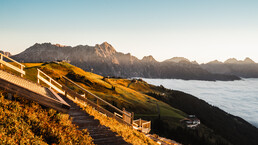 Sonnenaufgang auf den Bergen in Saalfelden | © Michael Geißler